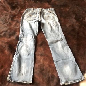 Cowgirl Tuff ranch worn jeans. 31X33